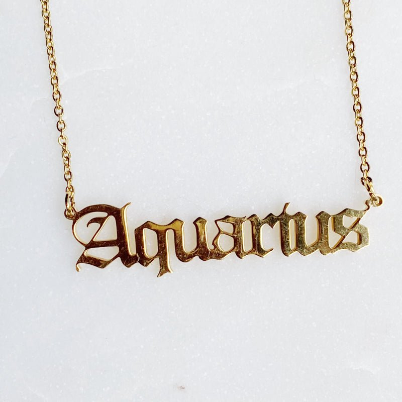 gold old english aquarius necklace