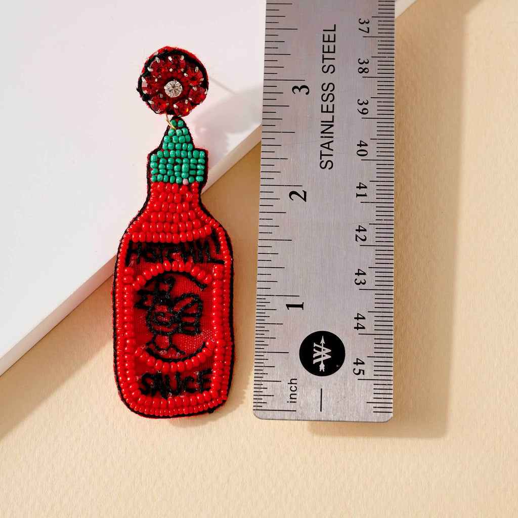 red hot sauce bottle seed bead earrings